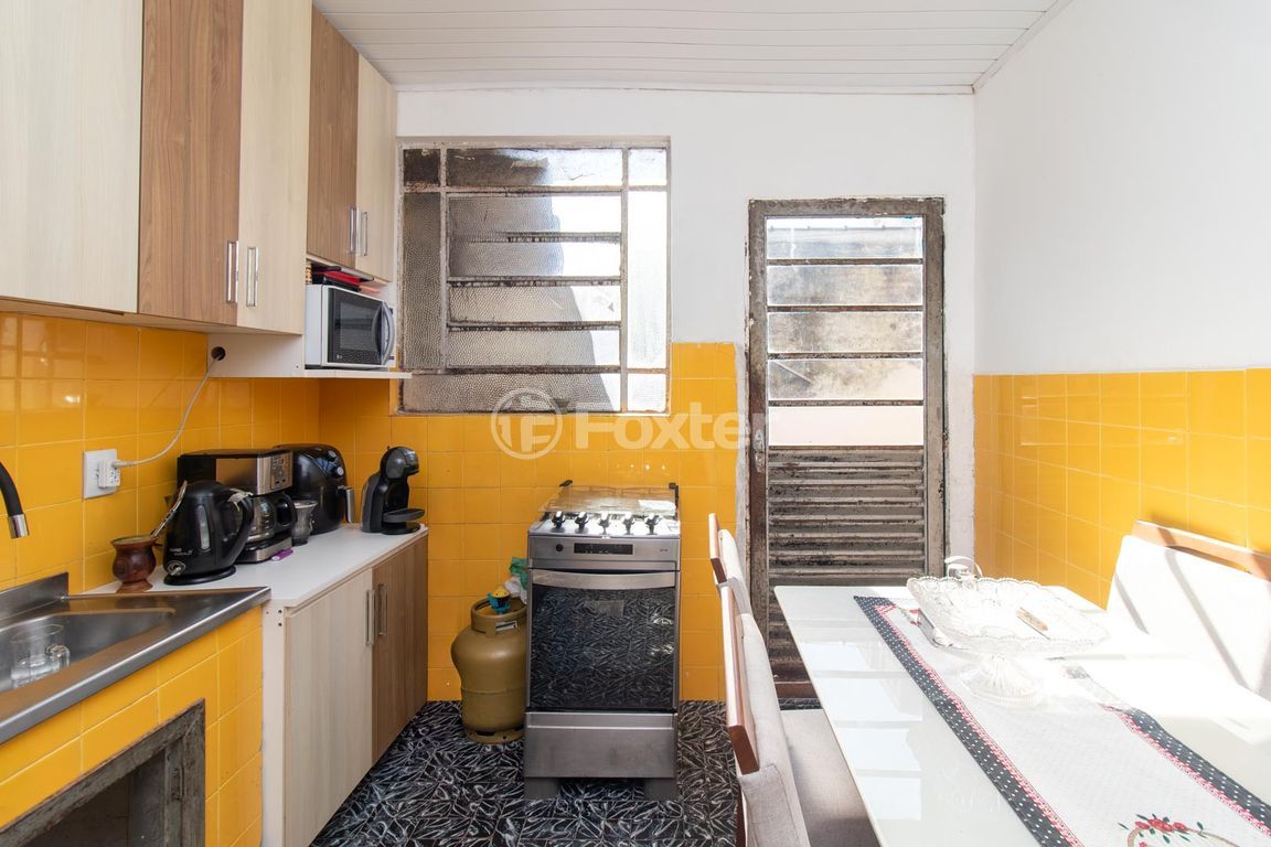 casa sobrado para comprar em Coronel Jaime da Costa Pereira, 363 - foto 15
