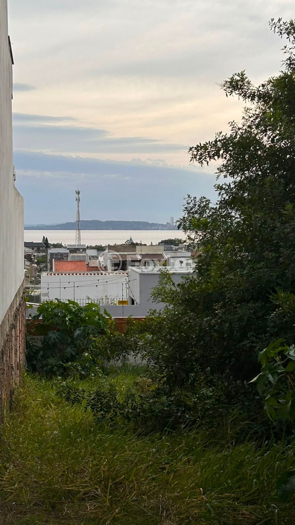 terreno lote condominio para comprar em Guarujá, Porto Alegre - foto 1