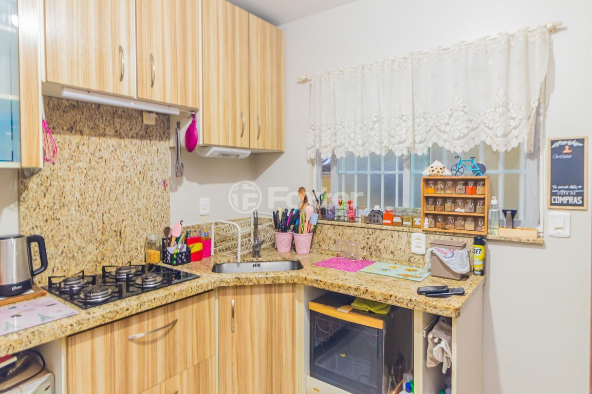 casa sobrado para comprar em Mário Meneghetti, 694 - foto 18