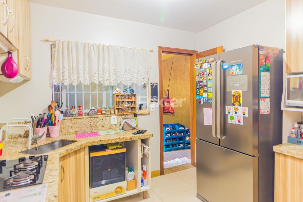 casa sobrado para comprar em Mário Meneghetti, 694 - foto 17