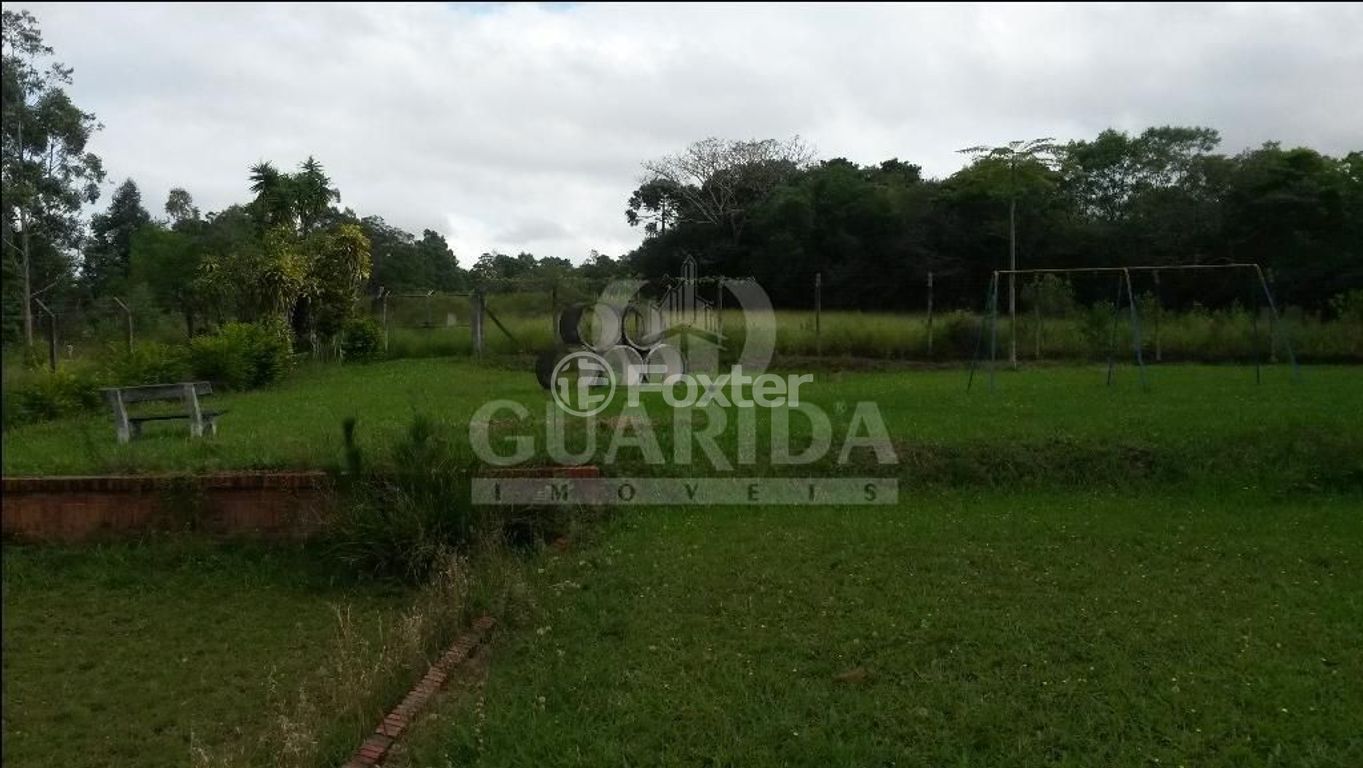 terreno lote condominio para comprar em Orquídea, 474 - foto 13