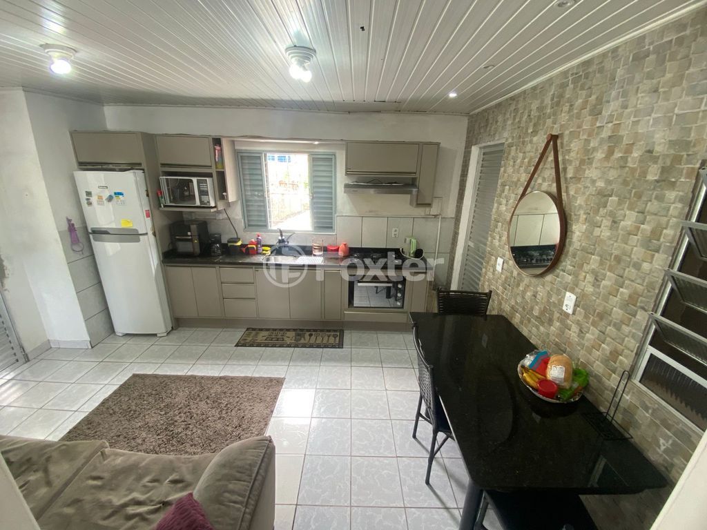 casa sobrado para comprar em Odilon Funk Tubino, 117 - foto 25
