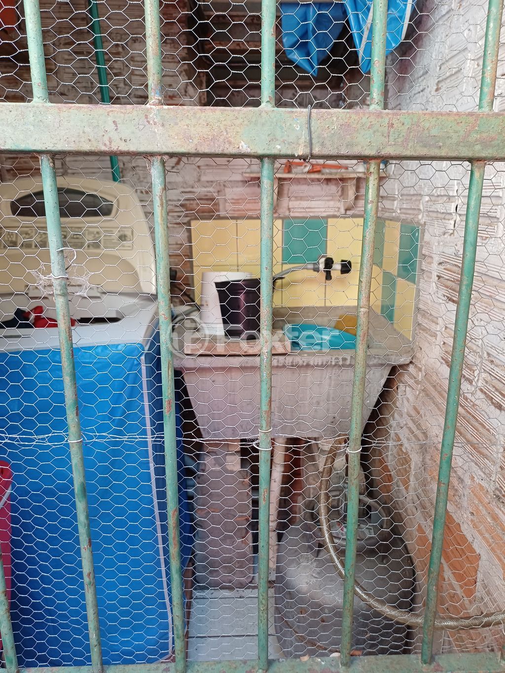 terreno lote condominio para comprar em Aldrovando Leão, 366 - foto 11